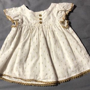 Gold and creme baby dress
